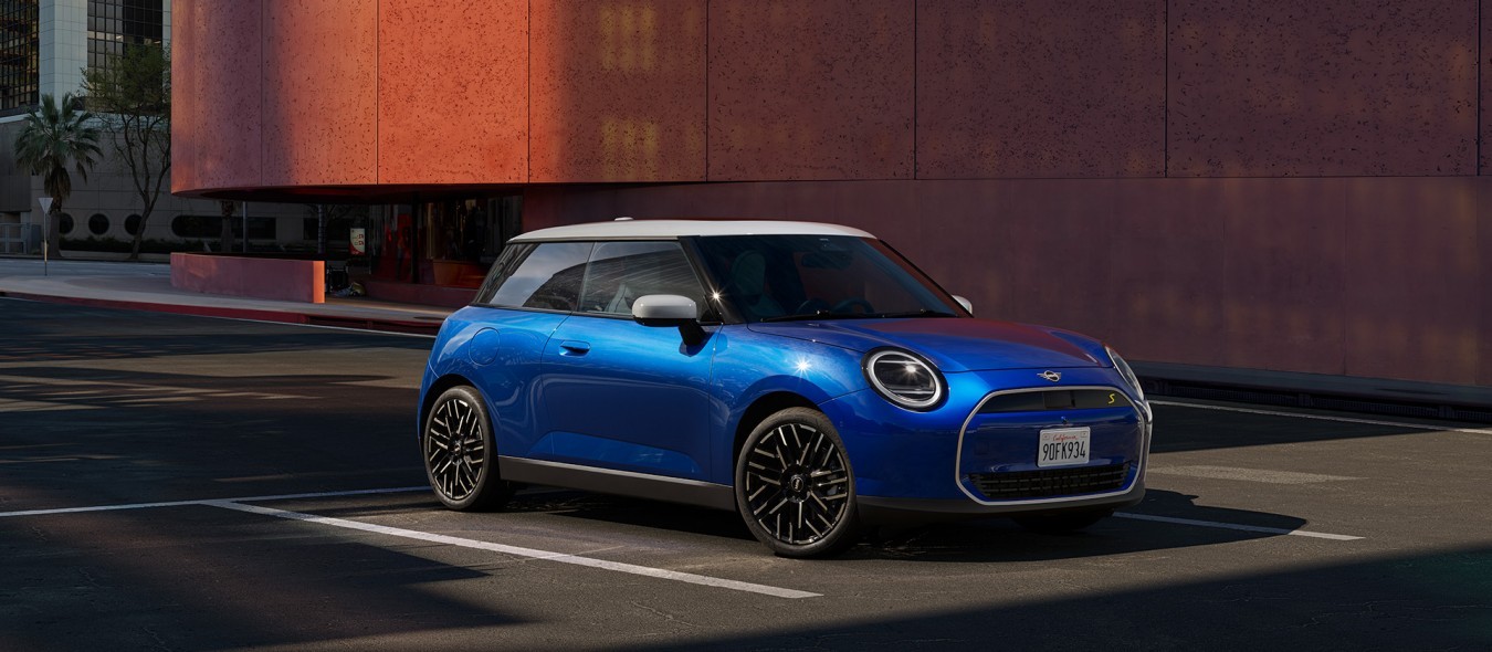 MINI Cooper 3-door driving down the street